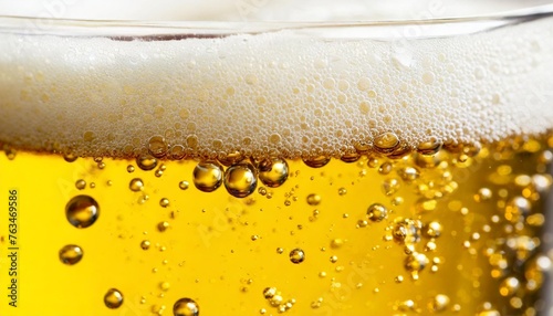 close up background of beer with bubbles in glass