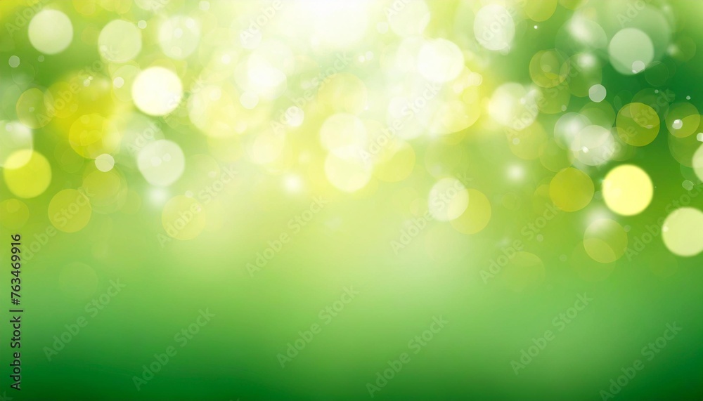 spring or summer background green and yellow blurred abstract background with magic lights