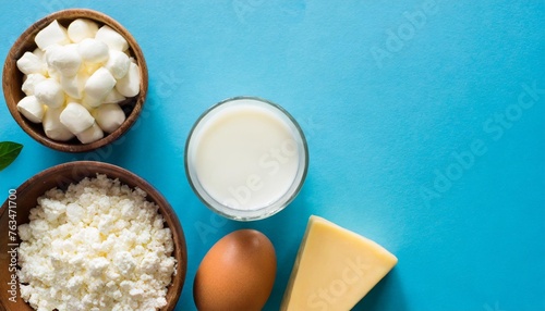 dairy products on a blue background with copy space healthy food