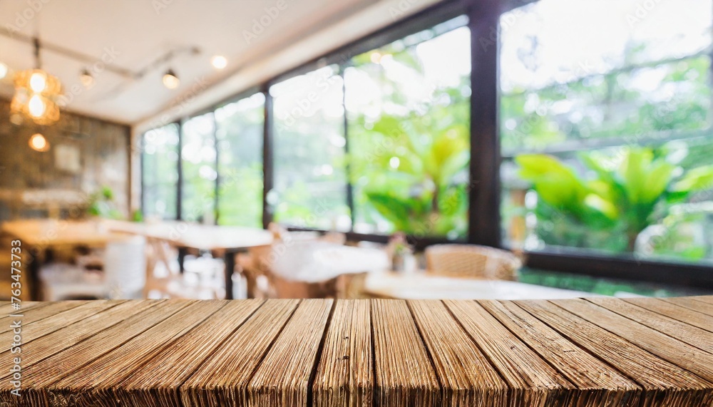 wooden table space with blur white clean cozy cafe and restaurant for advertising products montage background