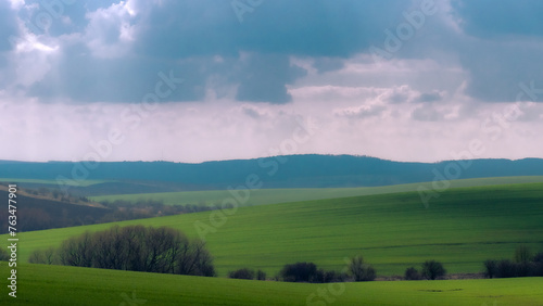 sky  landscape  field  grass  green  nature  meadow  summer  blue  tree  cloud  clouds  rural  spring  horizon  agriculture  countryside  country  farm  forest  land  hill  season  beautiful  outdoor