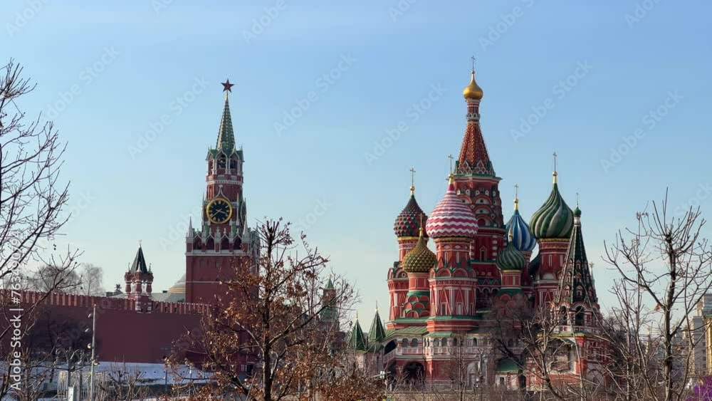 Moscow Kremlin clock tower and St. Basil Cathedral on Red Square Moscow Kremlin clock tower and St. Basil Cathedral on Red Square