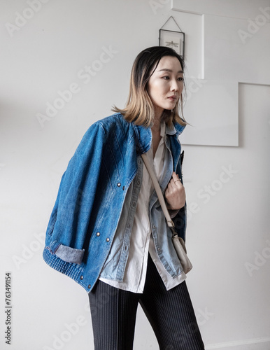Woman wearing denim jacket