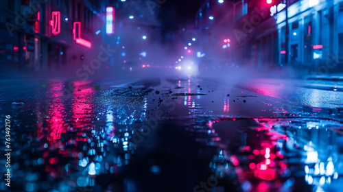 Wet asphalt with reflection of neon lights  spotlight  smoke. Abstract light on a dark street with smoke  smog. Dark background picture of an empty street  night view  night city.