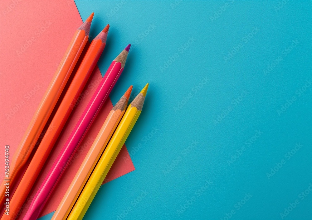 Vibrant Colored Pencils on a Duo Tone Background for Creative Projects Vibrant Colored Pencils on a Duo Tone Background for Creative Projects