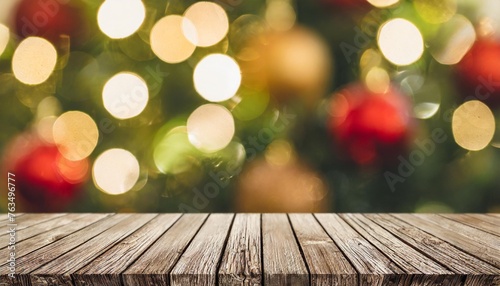 festive blurred background with bokeh and empty wooden table in the foreground