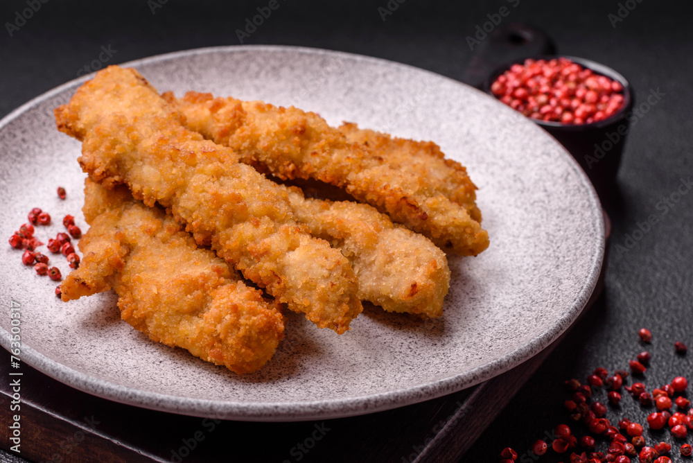 Delicious fresh chicken or turkey strips or nuggets breaded with salt and spices Delicious fresh chicken or turkey strips or nuggets breaded with salt and spices