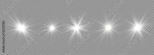 Sparkling stars, twinkling and flashing lights. Collection of various light effects on a black background. Realistic vector graphics photo