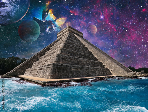 Chichen Itza under stars and ocean coming to it, Maya Temple, Mexico