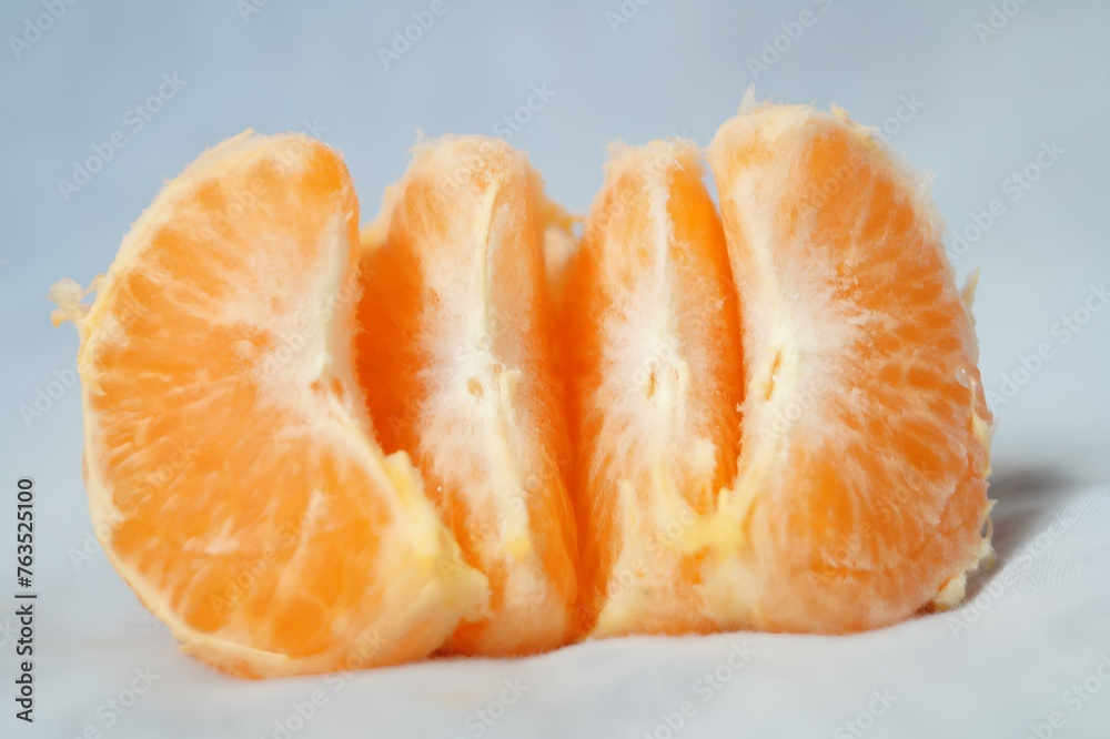 A peeled orange with the top cut off