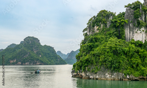Halong Bay, Vietnam - August 26, 2023: fishing boat © Manel Vinuesa
