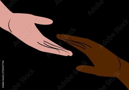 Hechando una mano a los inmigrantes o refugiados. Mano blanca ayudando a una mano negra