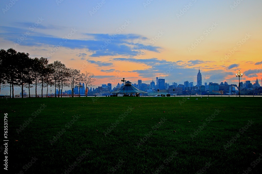 Panorama New York city Manhattan skyline cityscape at sunset from New Jersey. 