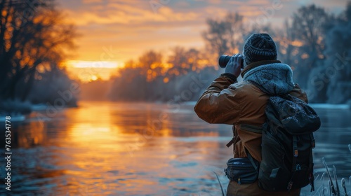 Man Taking Picture Next to River