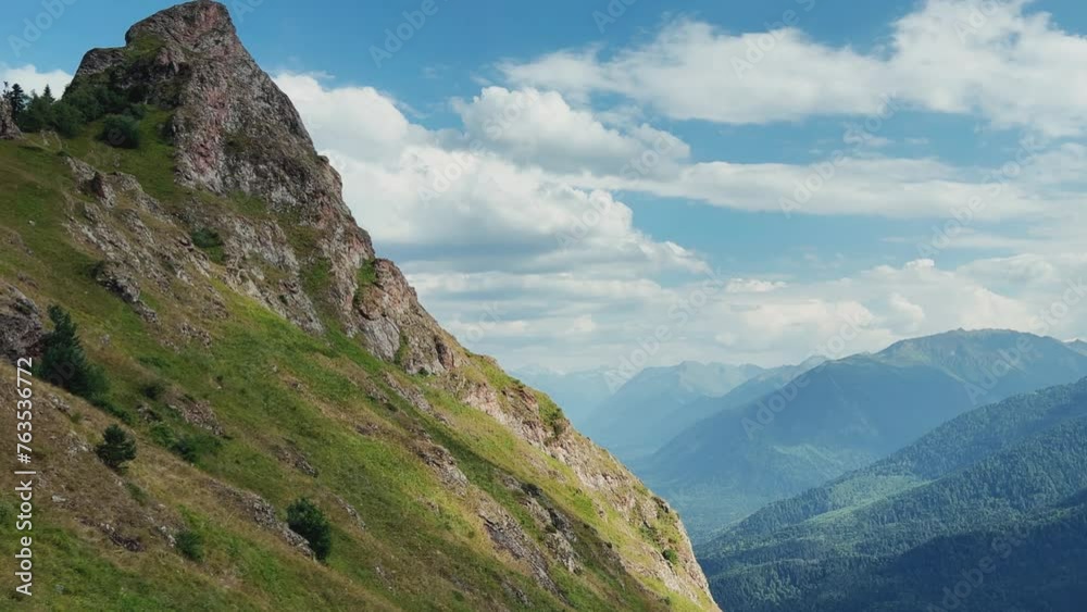 View of the mountain range near Mount Zakan. The top of the mountain node of the western part of the main ridge of the Greater Caucasus. Zakan Peak is the beginning of the Magisho mountain range. 4К View of the mountain range near Mount Zakan. The top of the mountain node of the western part of the main ridge of the Greater Caucasus. Zakan Peak is the beginning of the Magisho mountain range. 4К