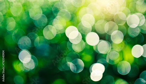green panoramic bokeh lights abstract background bokeh on the background blurred the natural green and white