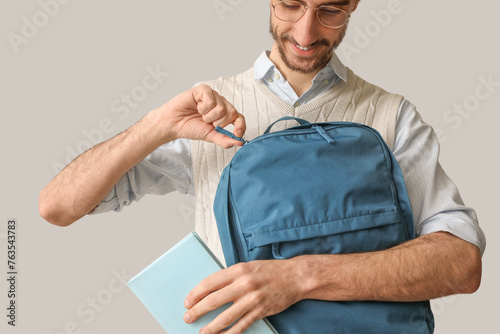 Male student with backpack ...