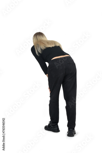 back view of a woman looking down on white background