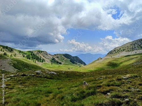 Fototapeta Naklejka Na Ścianę i Meble -  French alpine foothills with grasses and dramatic sky