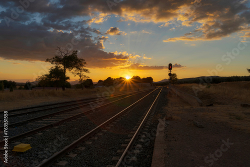 Railroad Tracks Leading into Sunset