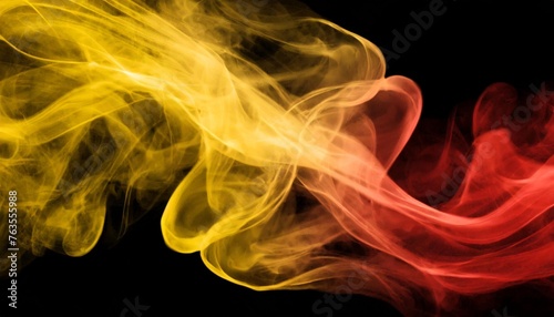 yellow and red smoke close up on black background