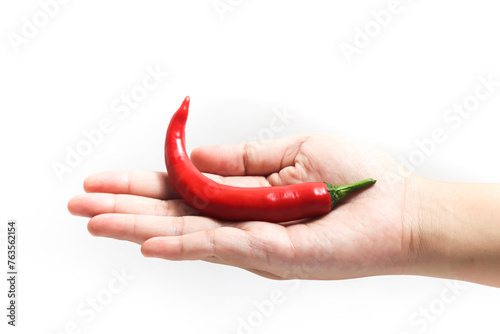Red hot chili pepper in open hand isolated on white background clipping path