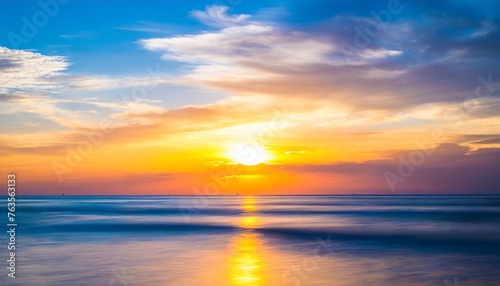 beautiful blurred defocused sunset sky and ocean nature background © Mac