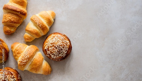 top view of fresh pastries and rolls on a light background showcasing culinary backgrounds