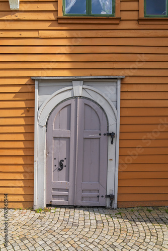 Wooden House and wooden door arch in Bryggen on Bergen