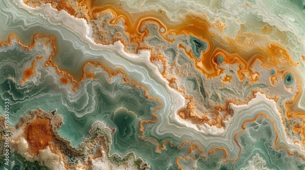  a close up of a marbled surface with orange, green, and white swirls on top of it.
