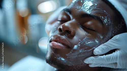 black man with facial treatment in aesthetic clinic, receives a botox injection above her face, her eyes are closed and the doctor is wearing medical gloves