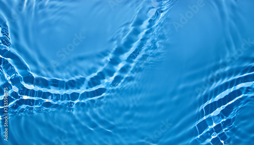 Blue Abstract background texture with water ripples and waves. Copy space. Top view flat lay © Uuganbayar