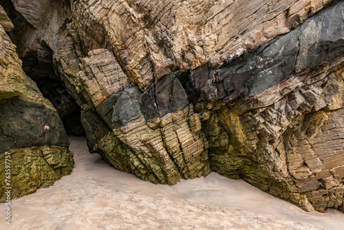 Rocky cave at Maghera beach, County Donegal, Ireland photo