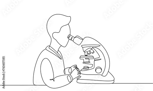 Laboratory assistant and microscope