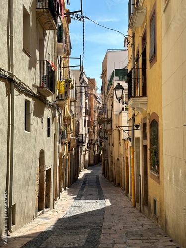 Tarragona Old Town. Narrow Alleyway in a Colorful European Town