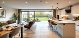 Open-plan living with a white kitchen, quartz worktops, a spacious lounge area, and bi-fold doors to the garden.
