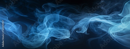 Abstract blue smoke moves on black background. Blue fog on the empty dark scene, studio room with mist
