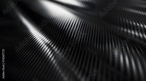 carbon kevlar fiber texture pattern backdrop, elaborate industrial carbon fiber wavy sheet structure detail in full frame view