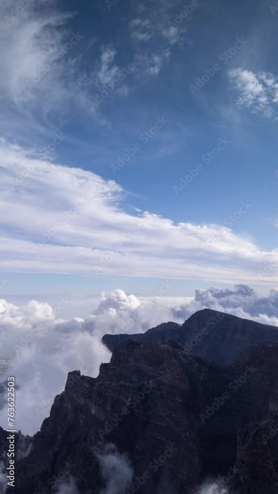Above the clouds at el roque de los muchachos, la palma in vertical format Above the clouds at el roque de los muchachos, la palma in vertical format