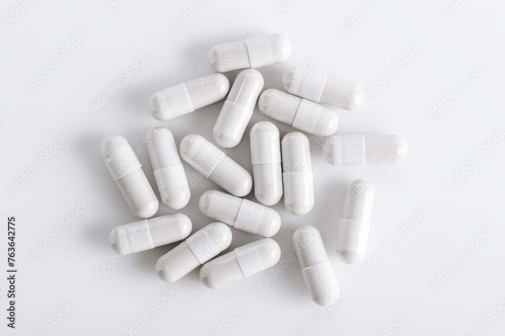Top view of Capsule pills on white background.