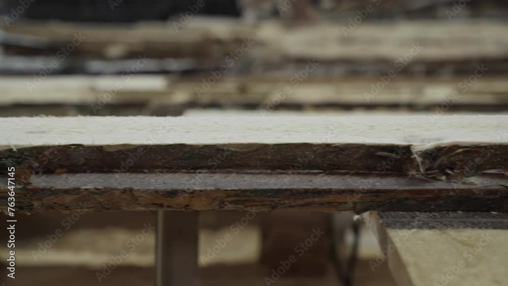 Close Up Of Wooden Plank Material Stacking Process By Forestry Workshop Worker. Manual Plank Material Stack By Worker At A Wood Factory Warehouse. Freshly Cut Timber Planks Material Stacking. Close Up Of Wooden Plank Material Stacking Process By Forestry Workshop Worker. Manual Plank Material Stack By Worker At A Wood Factory Warehouse. Freshly Cut Timber Planks Material Stacking.