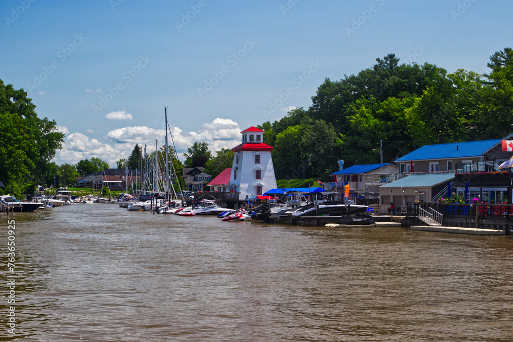 Naklejka premium Lighthouse and the clubhouse by the water - Grand Bend, ON, Canada
