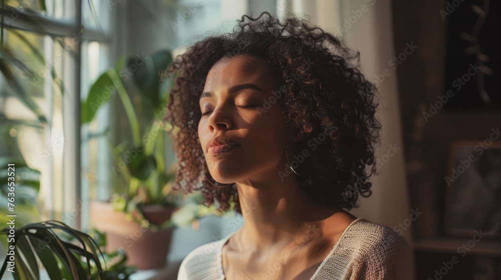 Serene woman meditating at home, eyes closed, relaxing body and mind, mental health and stress relief, lifestyle photography