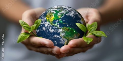 Hands cradling Earth with green leaves, symbolizing environmental protection and sustainability.