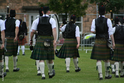 kilts, socks and grass