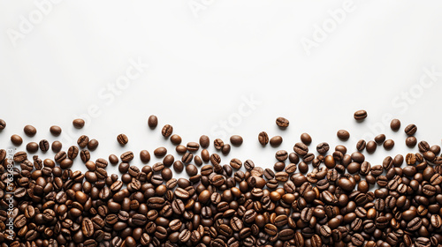 A close up of coffee beans on a white background