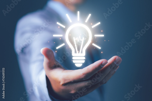 Businessman with light bulbs new ideas creative. Business, Development ideas.