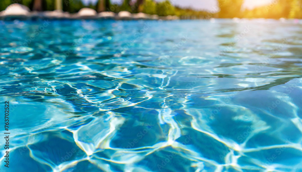 blue pool shines on a summer day Water Surface with Sunlight Defocus blurred transparent blue colored clear calm water surface texture with splashes and bubble