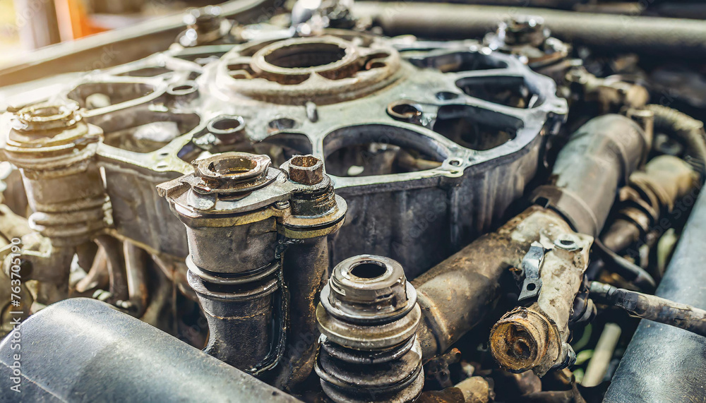 Old car engine part in auto repair garage