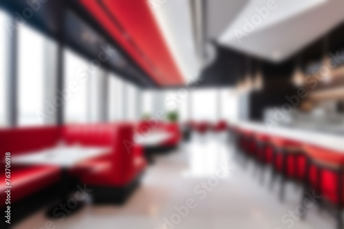 Blurred image of restaurant with light and bokeh for background usage. Blur interior background